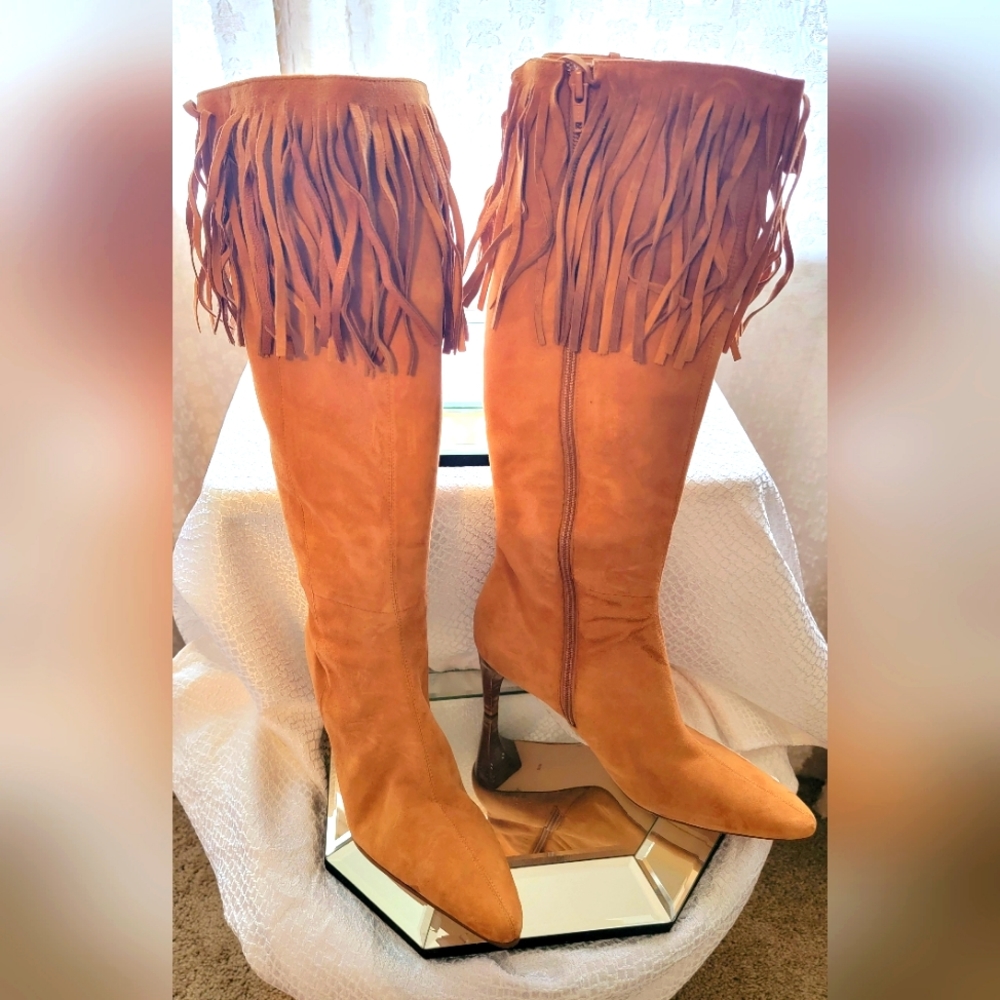 Knee high fringe boots